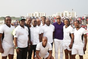 Lagos State Governor, Mr. Akinwunmi Ambode (4th right), with Managing Director, FCMB, Mr. Ladi Balogun (3rd right); Ex-Nigerian Footballers, Victor Ikpeba (2nd right); Mutiu Adepoju (bending in front); On-Air Personality, Mr. Frank Edoho (left); President-General, Nigeria Football Supporters Club, Dr. Rafiu Ladipo (2nd left); Special Adviser to the Governor on Sports, Mr. Deji Tinubu (4th left); Ex-Nigerian Footballer, Victor Agali (behind), others during the Opening of the 2016 COPA Lagos Beach Soccer Tournament at the Eko Atlantic City, Victoria Island, Lagos, on Sunday, December 11, 2016.