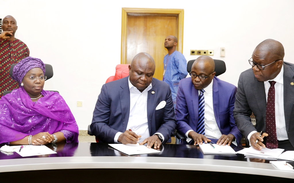 Photo of GOV. AMBODE AT SIGNING OF BOND DEAL WITH ISSUING HOUSES AT LAGOS HOUSE, IKEJA
